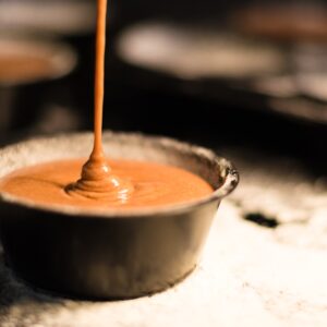drizzled caramel into clay bowl